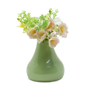 The Himalayan Goods Company Stoneware Ceramic Reed Vase Aroma Oil Diffuser 4 x 4 inches (Parrot Green)